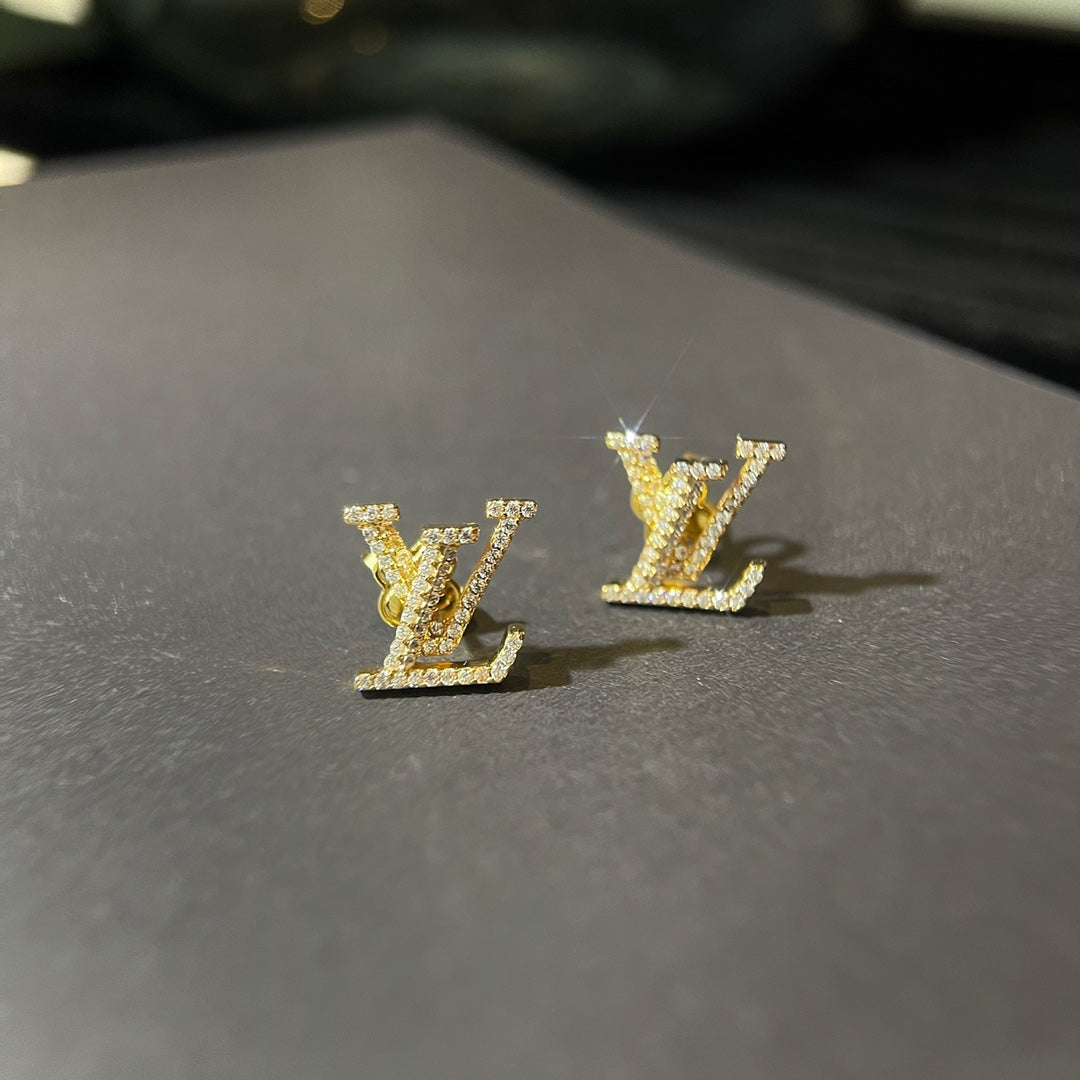 LV on sale logo gold earrings