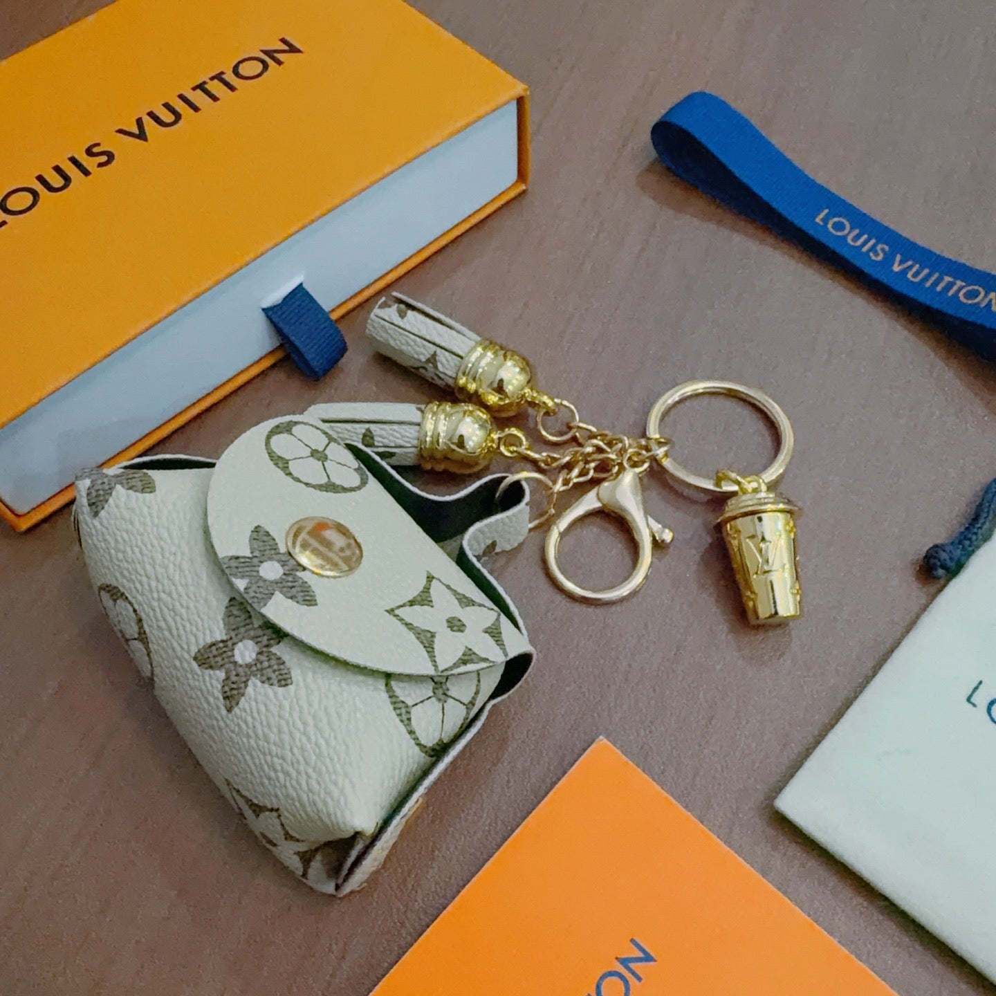 LV Brown and Beige Bag Charm With Gold Cup