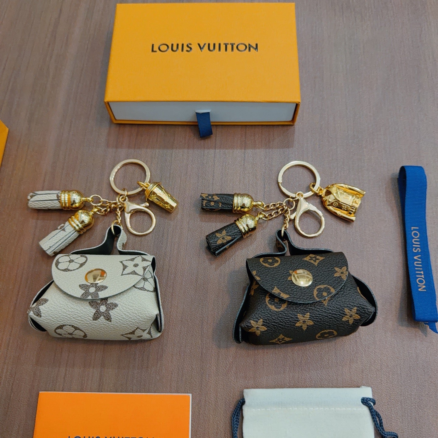 LV Brown and Beige Bag Charm With Gold Cup