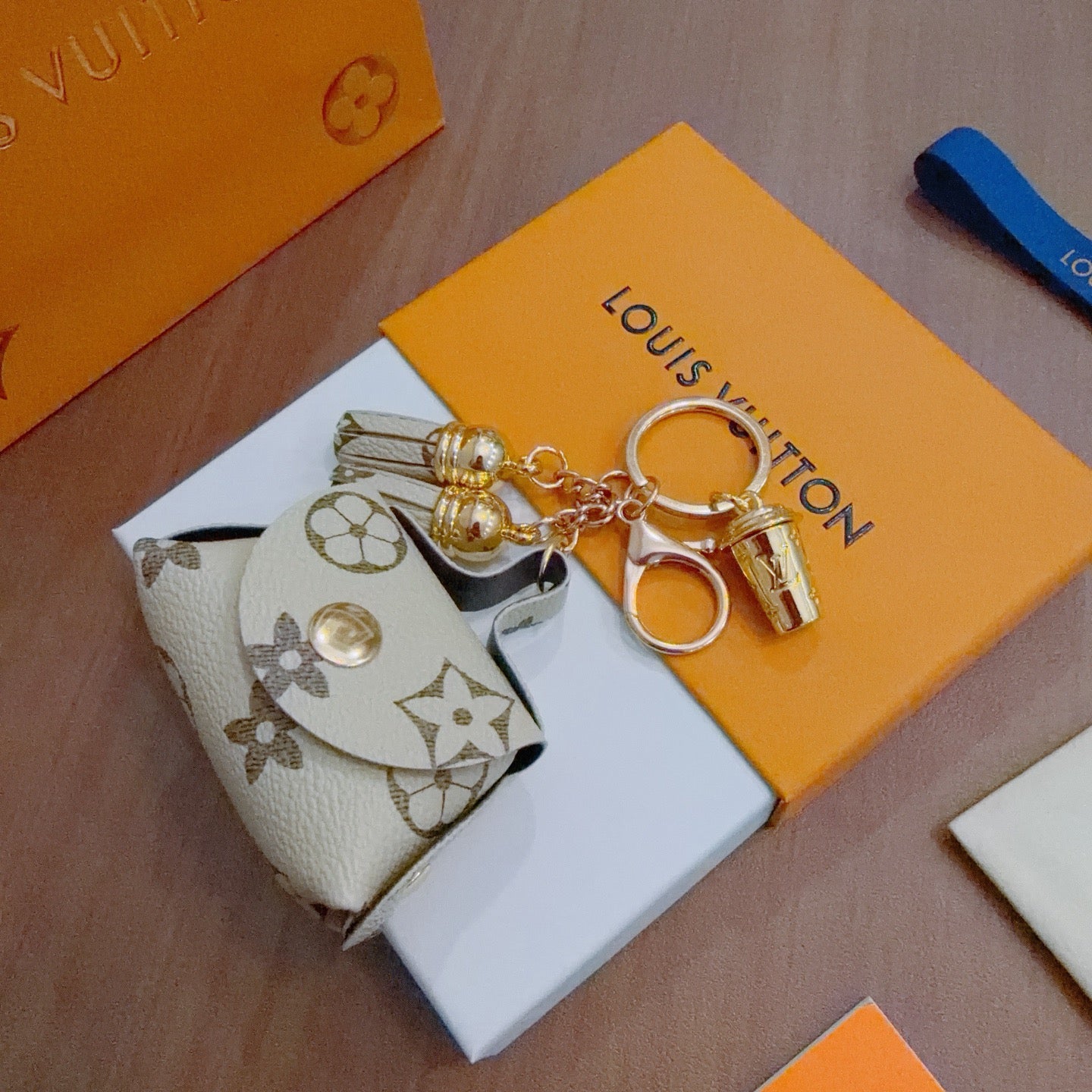 LV Brown and Beige Bag Charm With Gold Cup