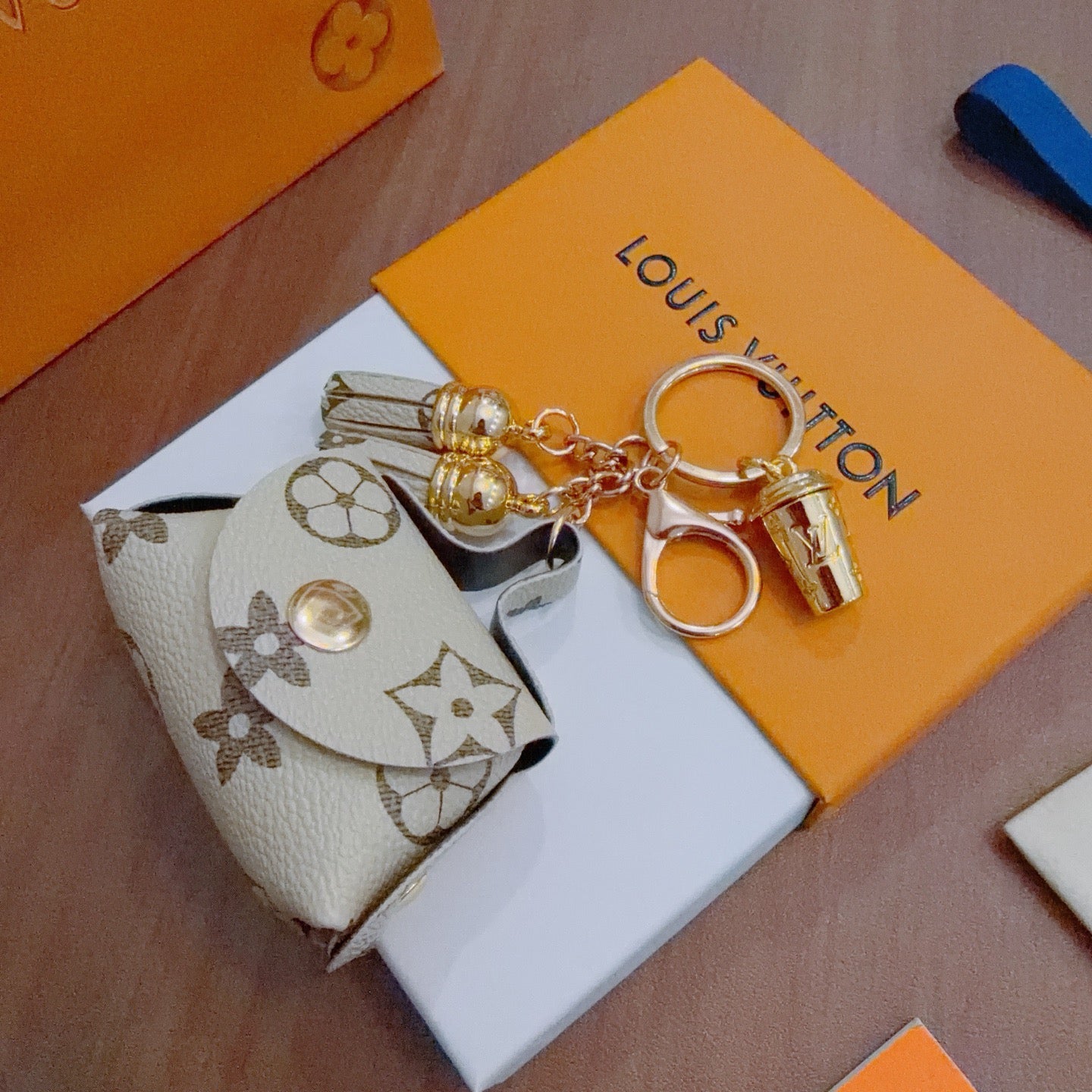 LV Brown and Beige Bag Charm With Gold Cup