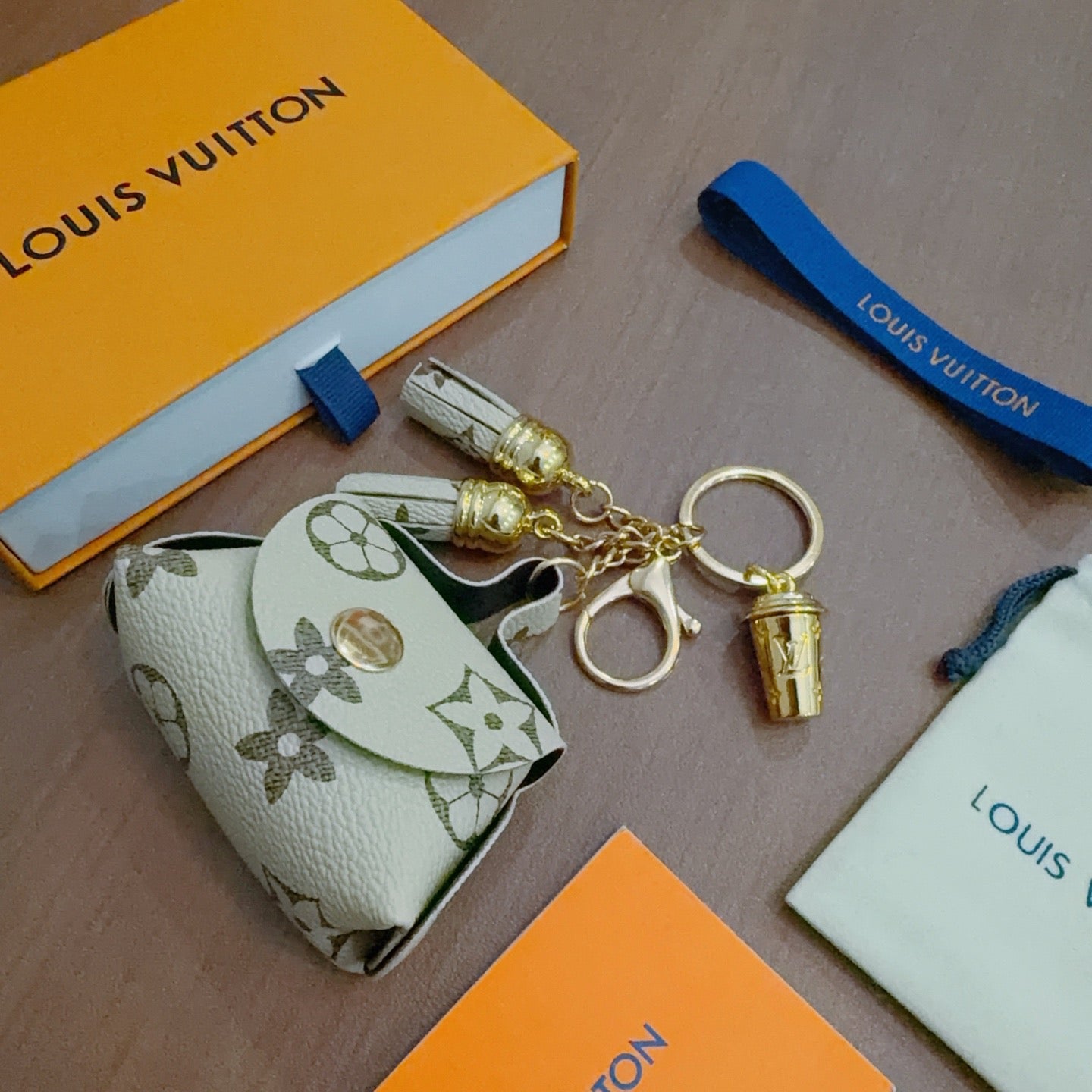 LV Brown and Beige Bag Charm With Gold Cup
