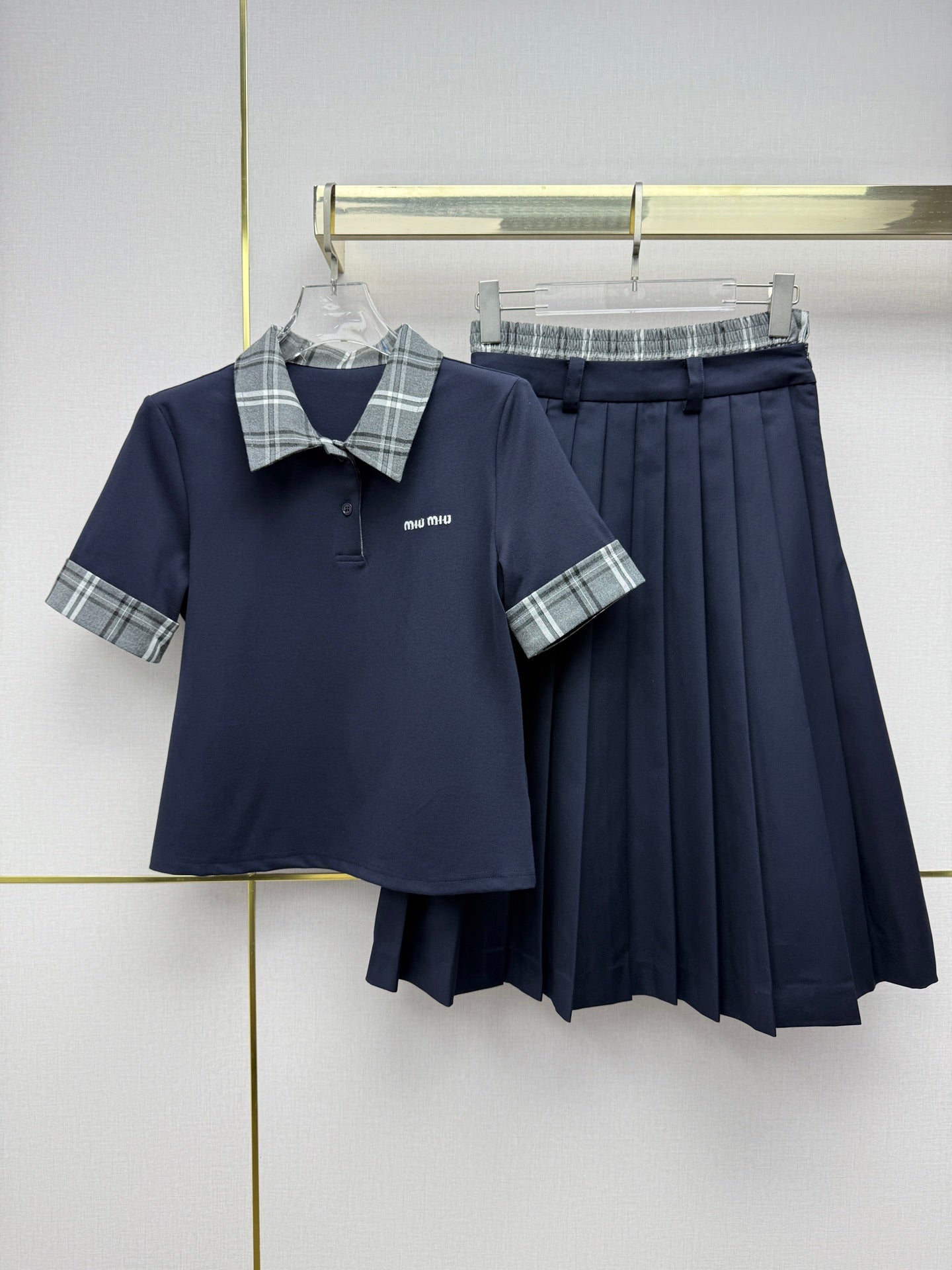 Miumiu 2026 Polo Collar and High-Waisted Pleated Skirt Cotton