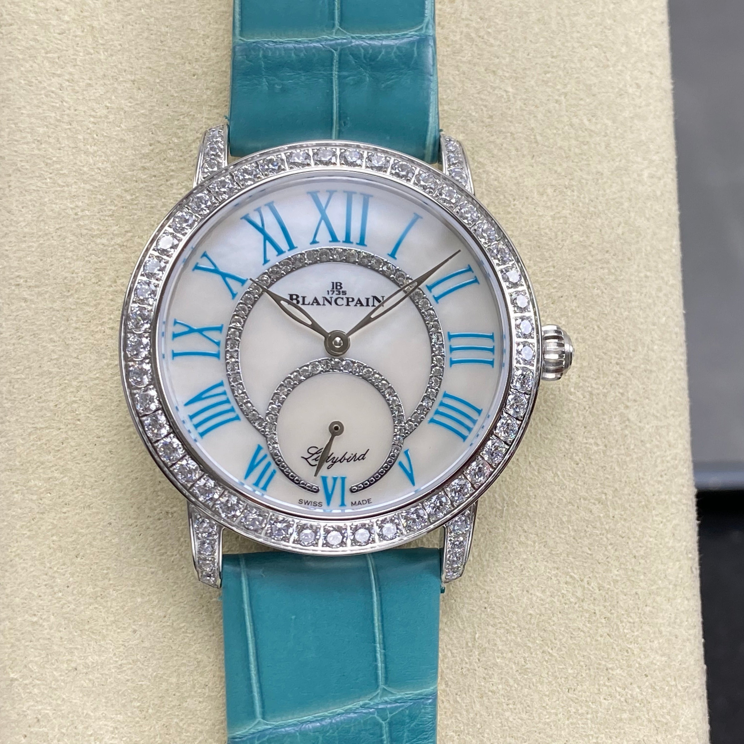 Blancpain's Ladybird 35mm White Blue Dial Diamond Bezel Crocodile Leather