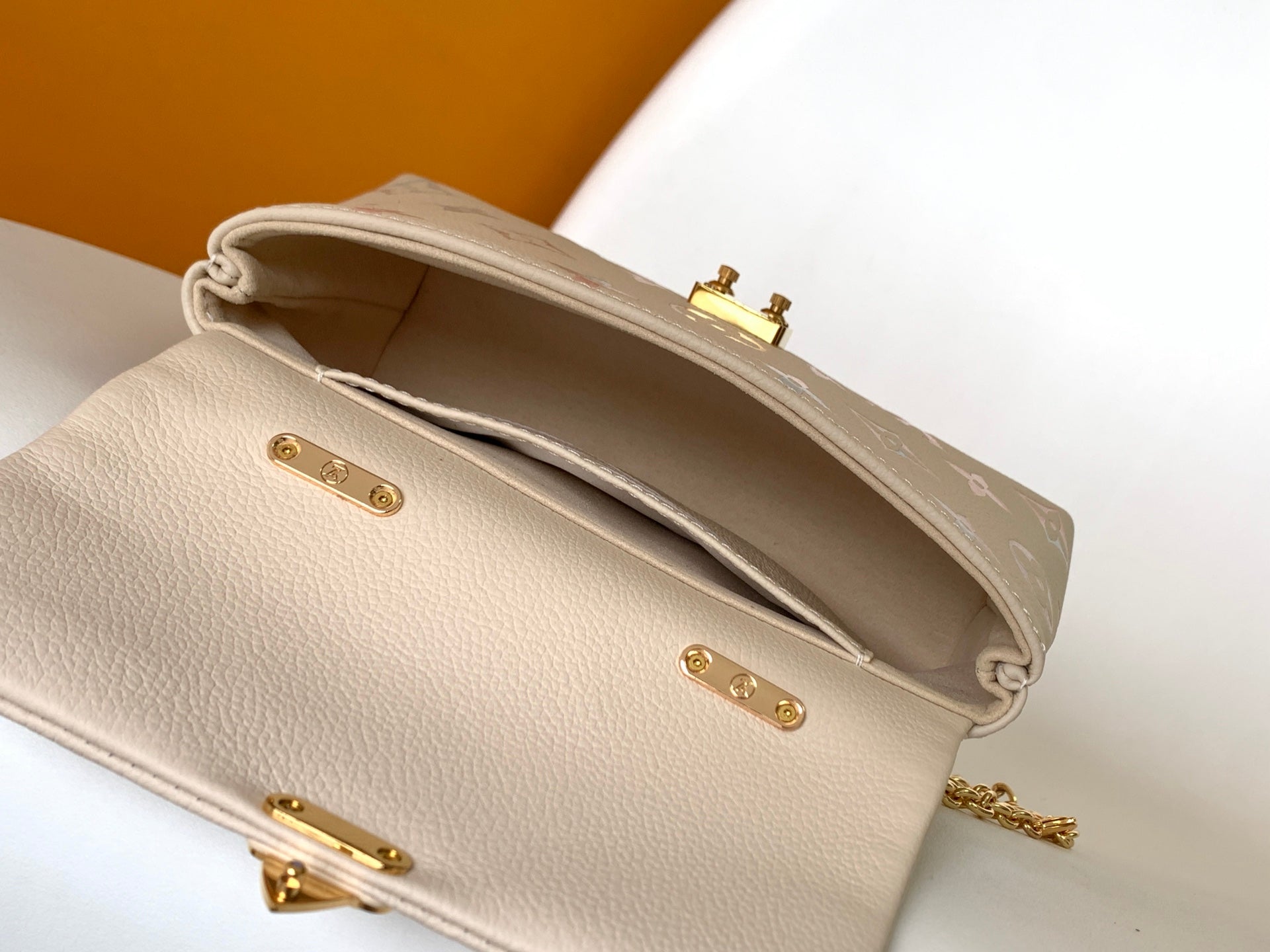 LV 2026 Nano Madeleine Handbag Beige Monogram Empreinte Leather 281645