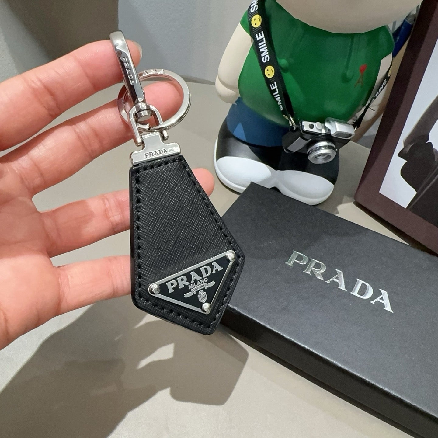 Prada Triangular Logo Charm 389051