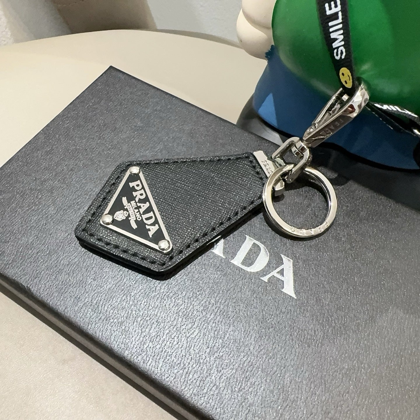 Prada Triangular Logo Charm 389051