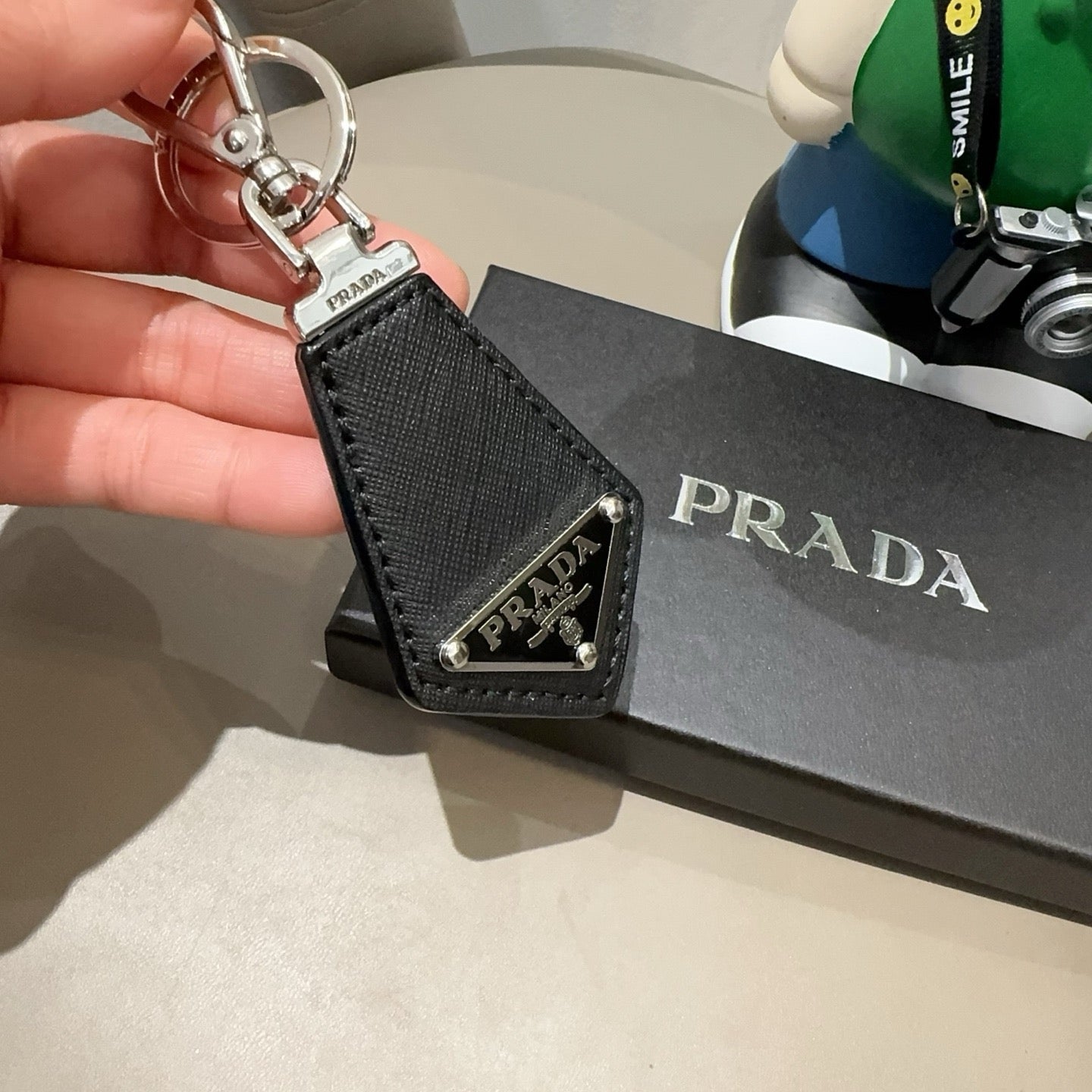Prada Triangular Logo Charm 389051