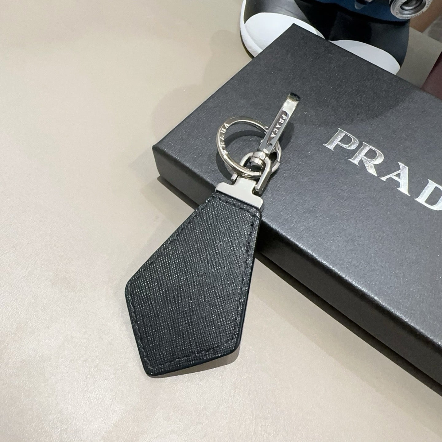 Prada Triangular Logo Charm 389051