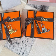 HM Snail Lock Bag Charm