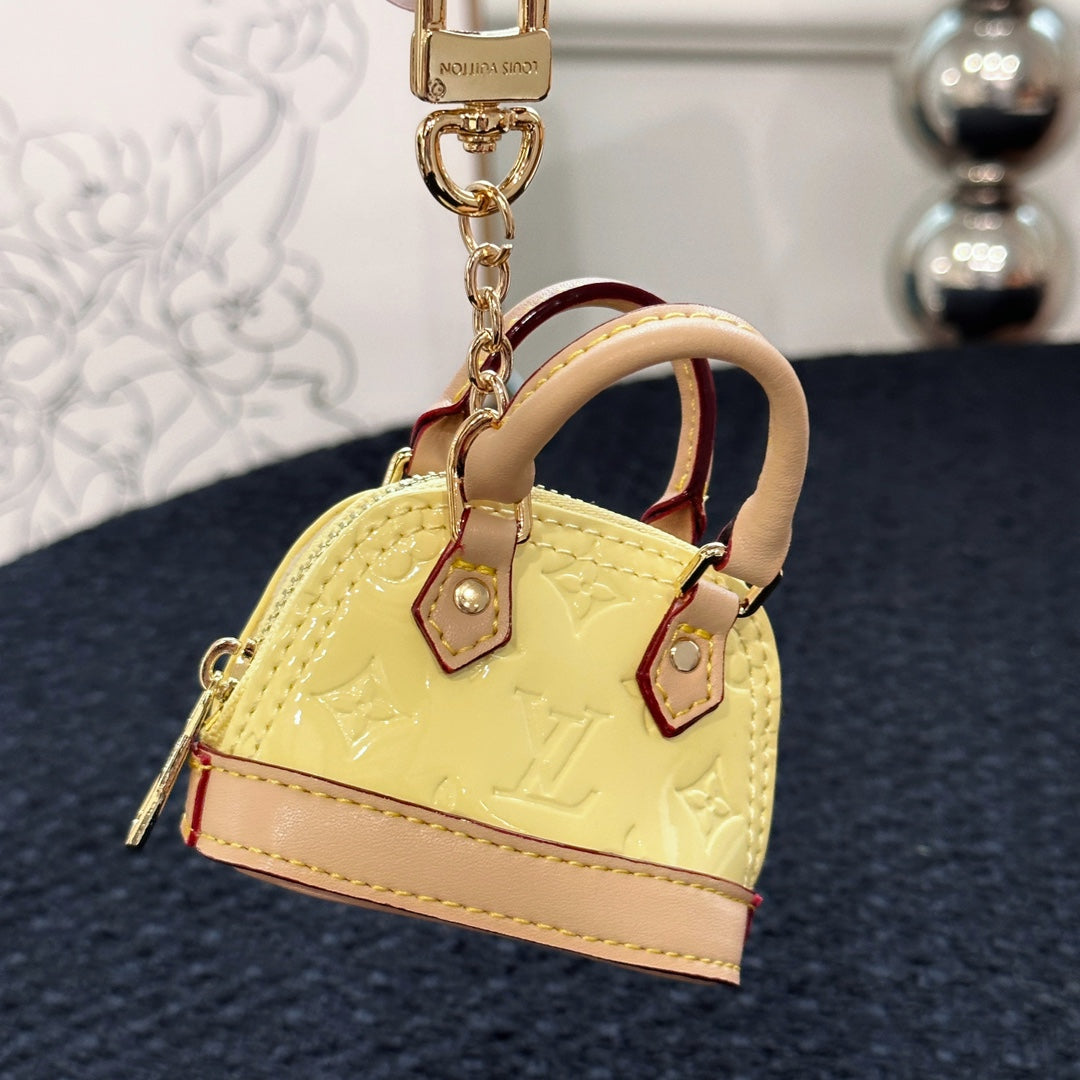 LV Alma Bag Charm Yellow mix Beige Cowhide Canvas