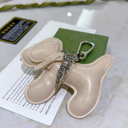 Gucci Beige Dog Charm