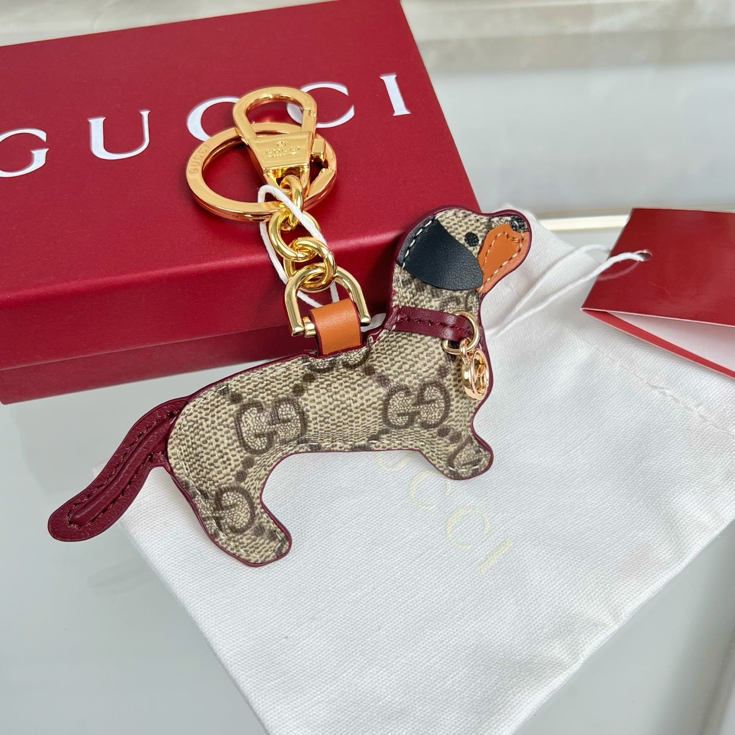 Gucci Dog-shaped Etoupe Gold Bag Charm
