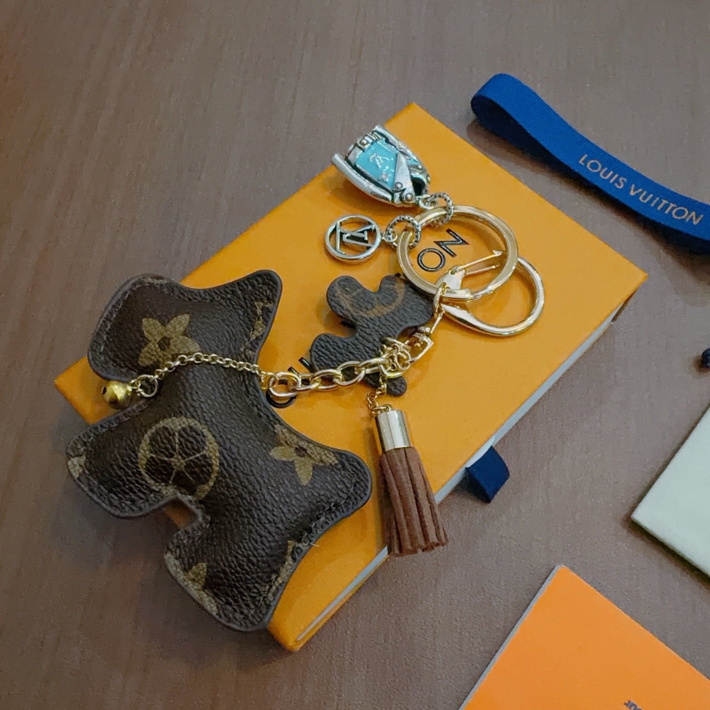 LV Brown Dog Charm With Silver Jacket