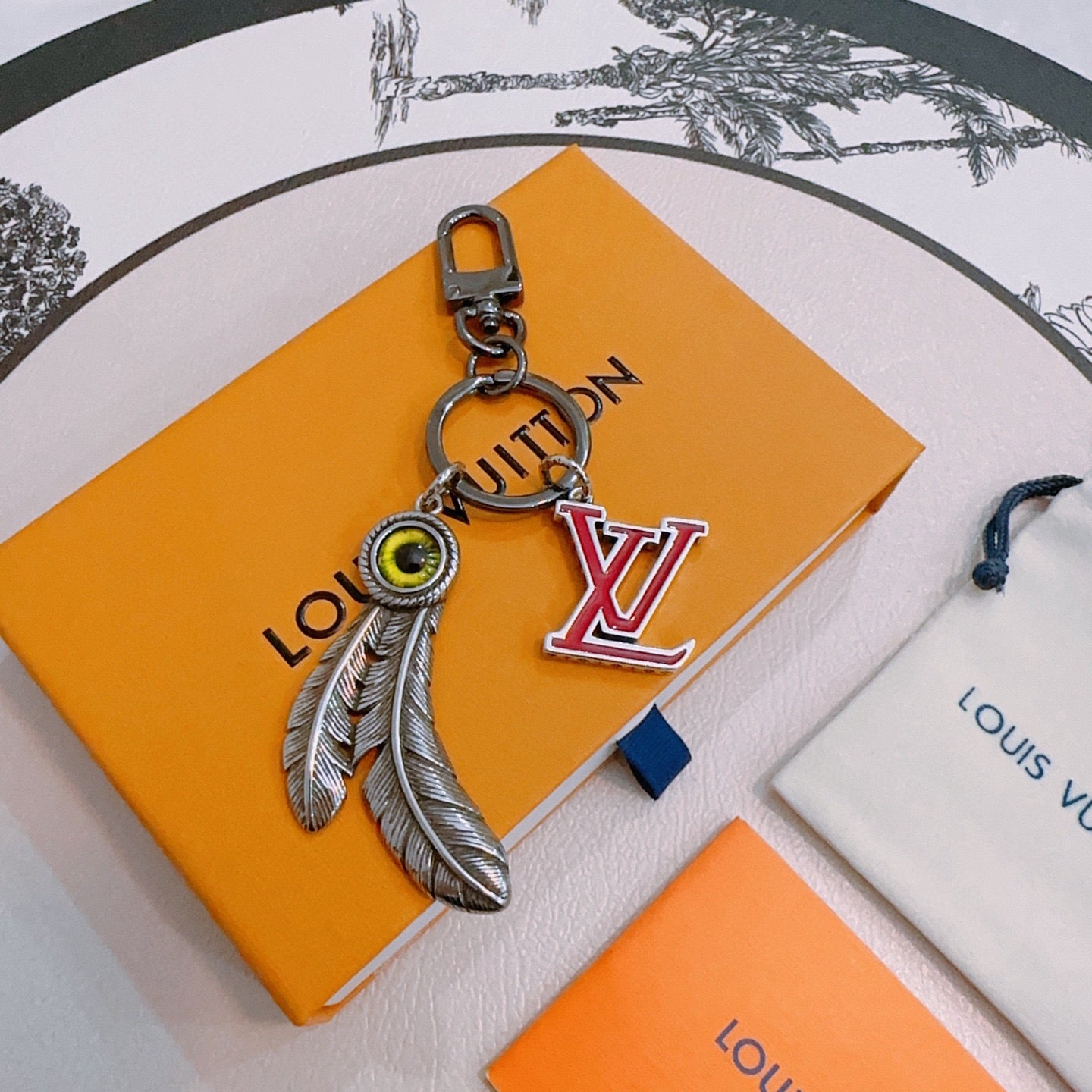 LV Eye And Feather Design Charm