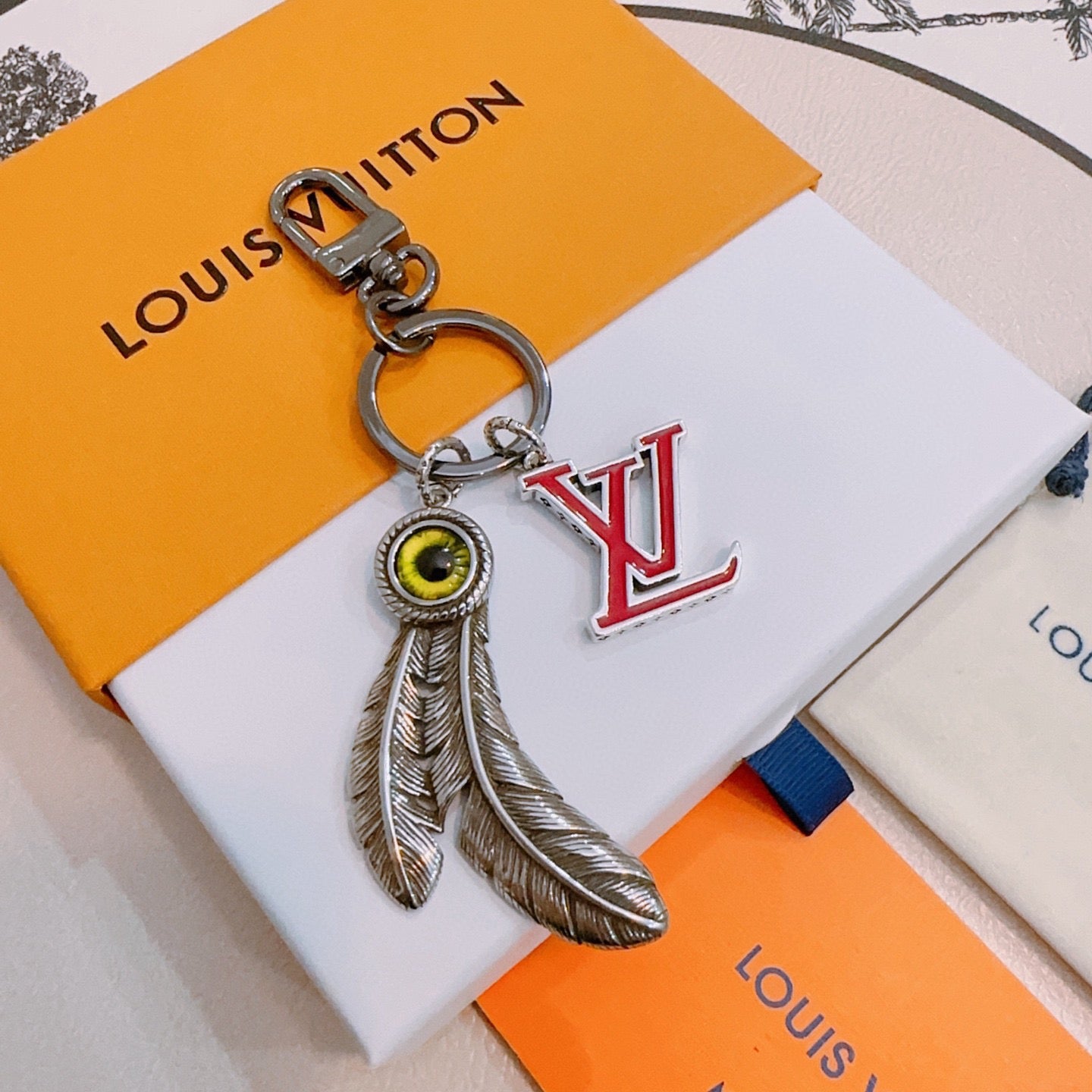 LV Eye And Feather Design Charm