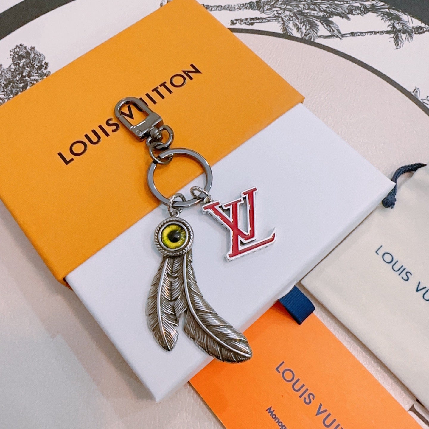 LV Eye And Feather Design Charm