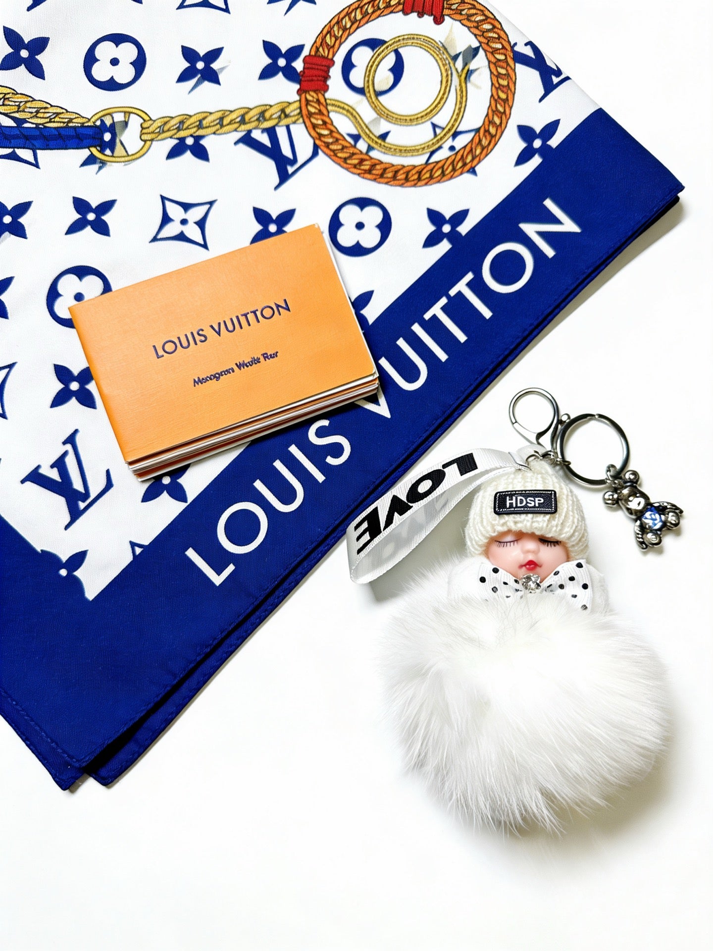 LV White Fluffy Plush Sleeping Baby Doll Charm